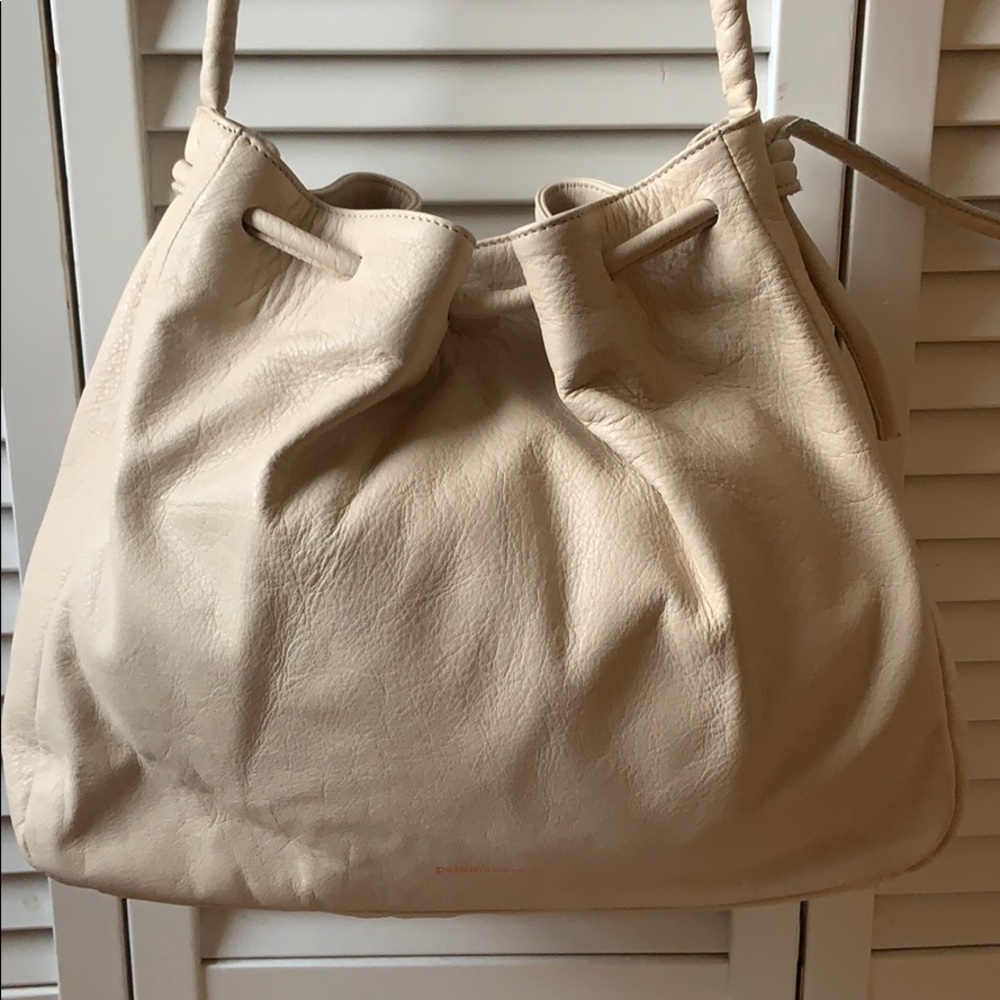 Paloma Wool cream drawstring bag